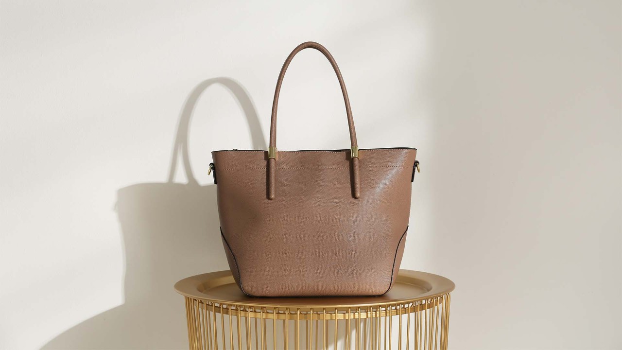 A luxury branded bag in brown
