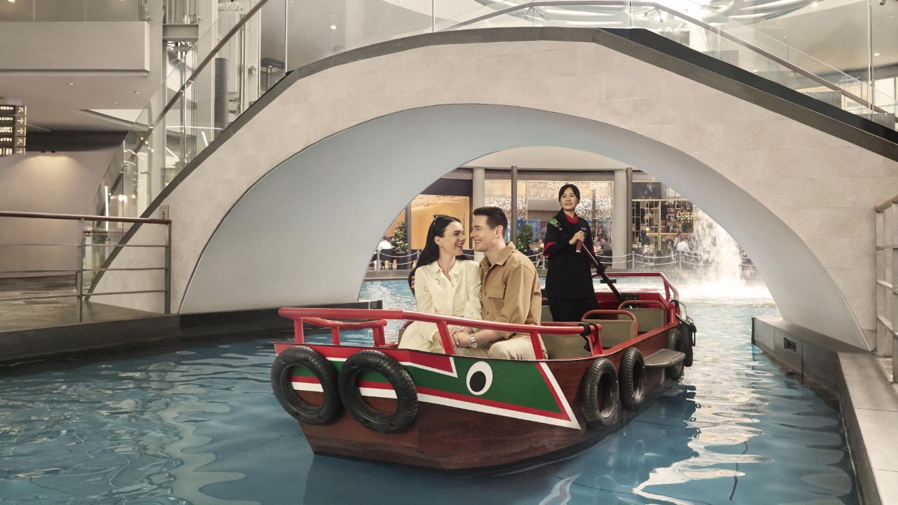Couple on Sampan Ride at The Shoppes